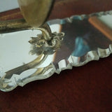 A Pair of Vintage Venetian Beveled Mirrorred Sconces